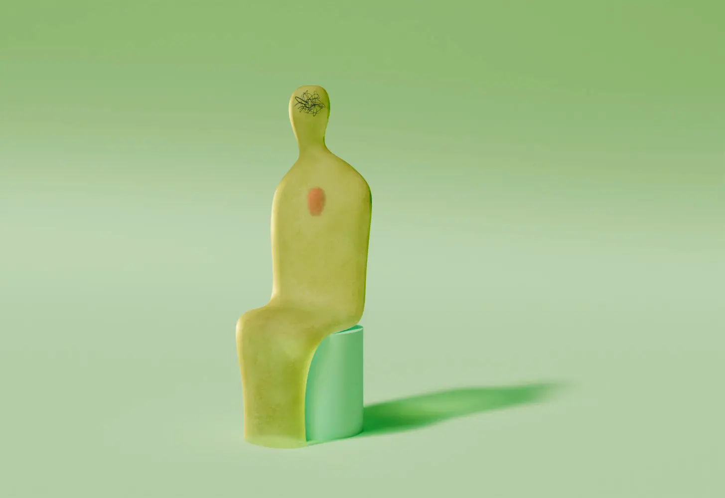 Viena žalia žmogiška forma sėdi ant kubo